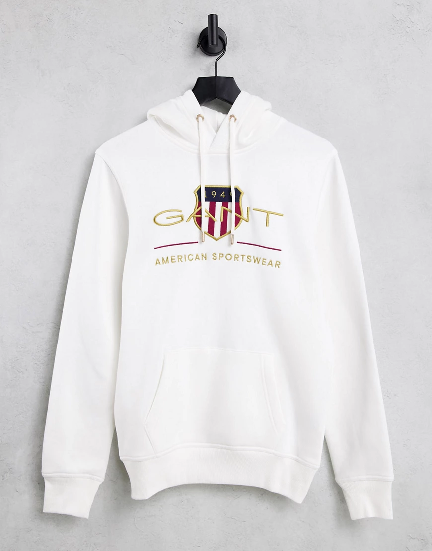 GANT – Kapuzenpullover mit Retro-Schutzschildlogo in Eierschalenweiß günstig online kaufen