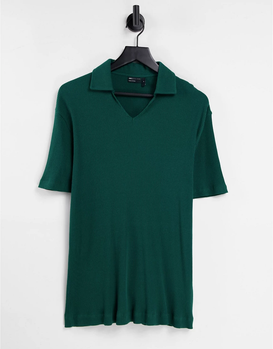 ASOS DESIGN – Lockeres, geripptes Polohemd in Grün mit Reverskragen und Pas günstig online kaufen