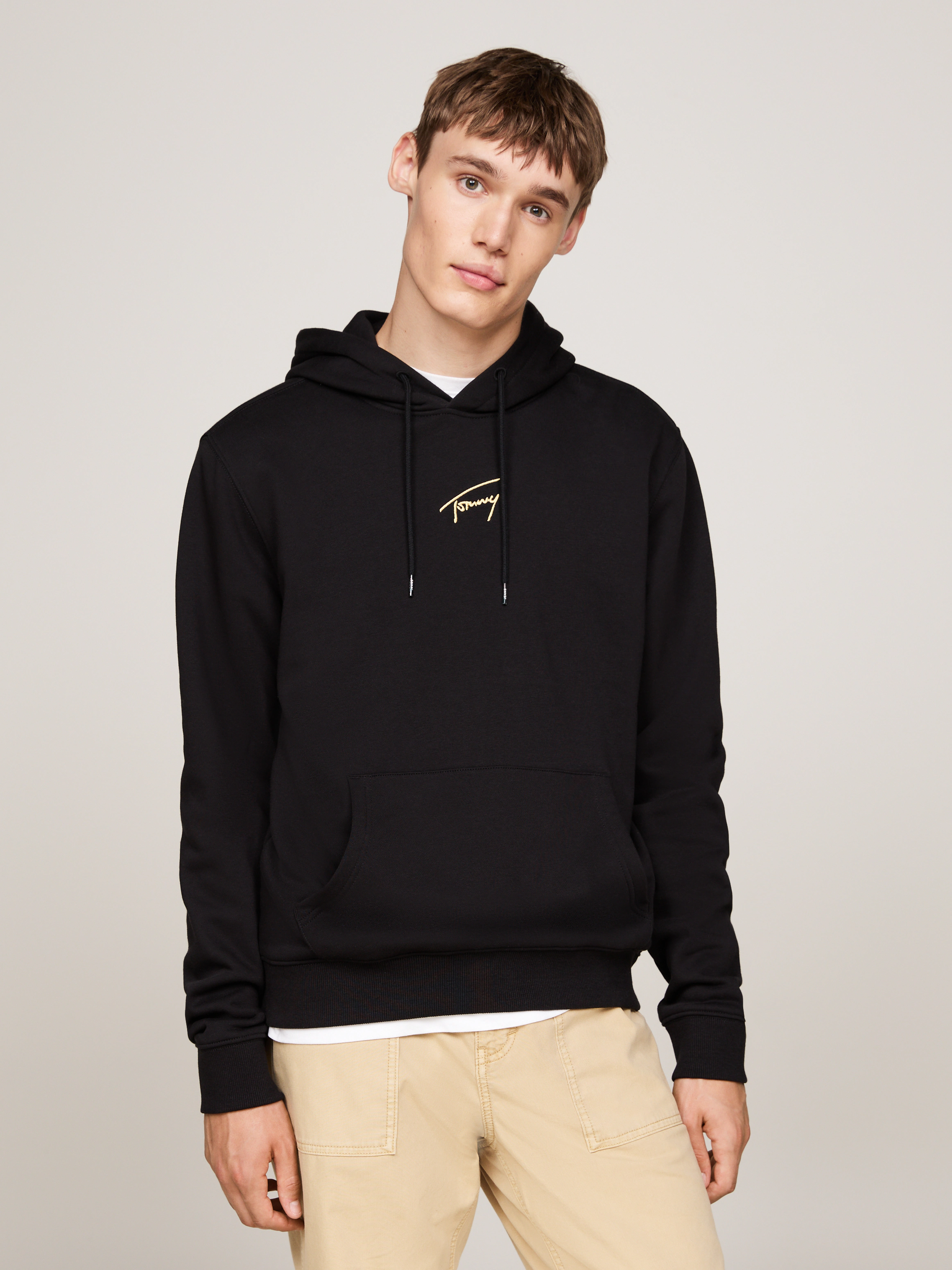 Tommy Jeans Sweatshirt "TJM REG GOLD SIGNT HOODIE EXT", mit bestickten Mark günstig online kaufen