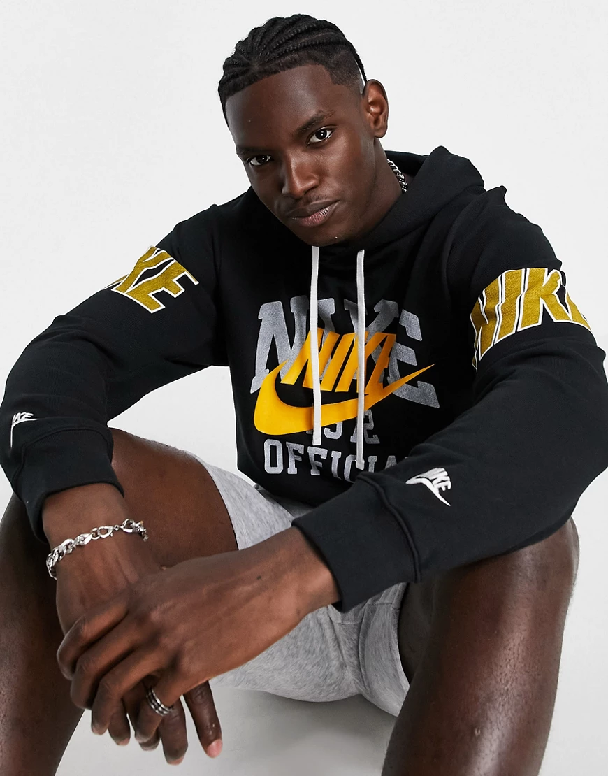 Nike – Kapuzenpullover in Schwarz und Gold mit Vintage-College-Print günstig online kaufen