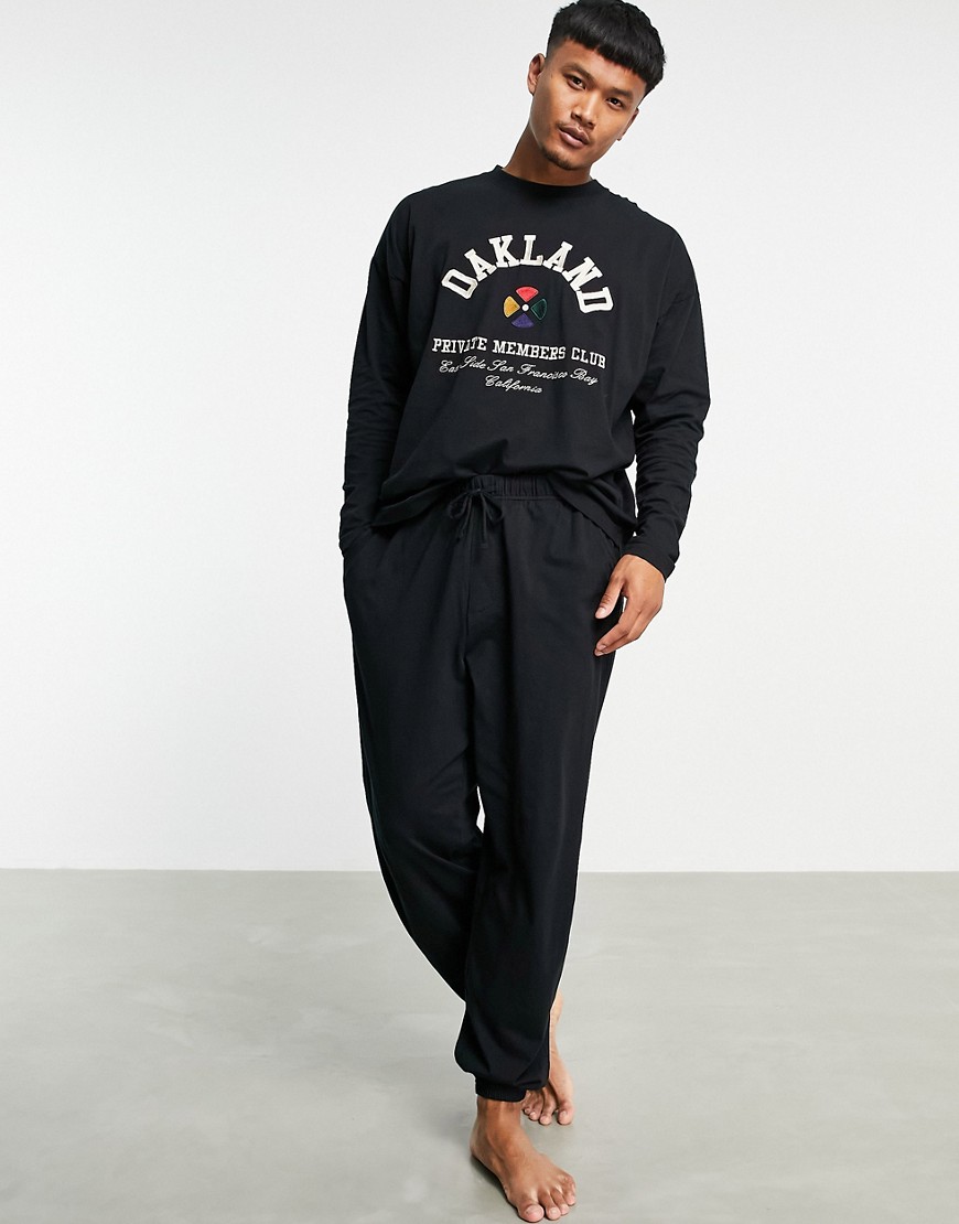 ASOS DESIGN – Pyjama mit „Oakland“-Vintage-Print-Schwarz günstig online kaufen