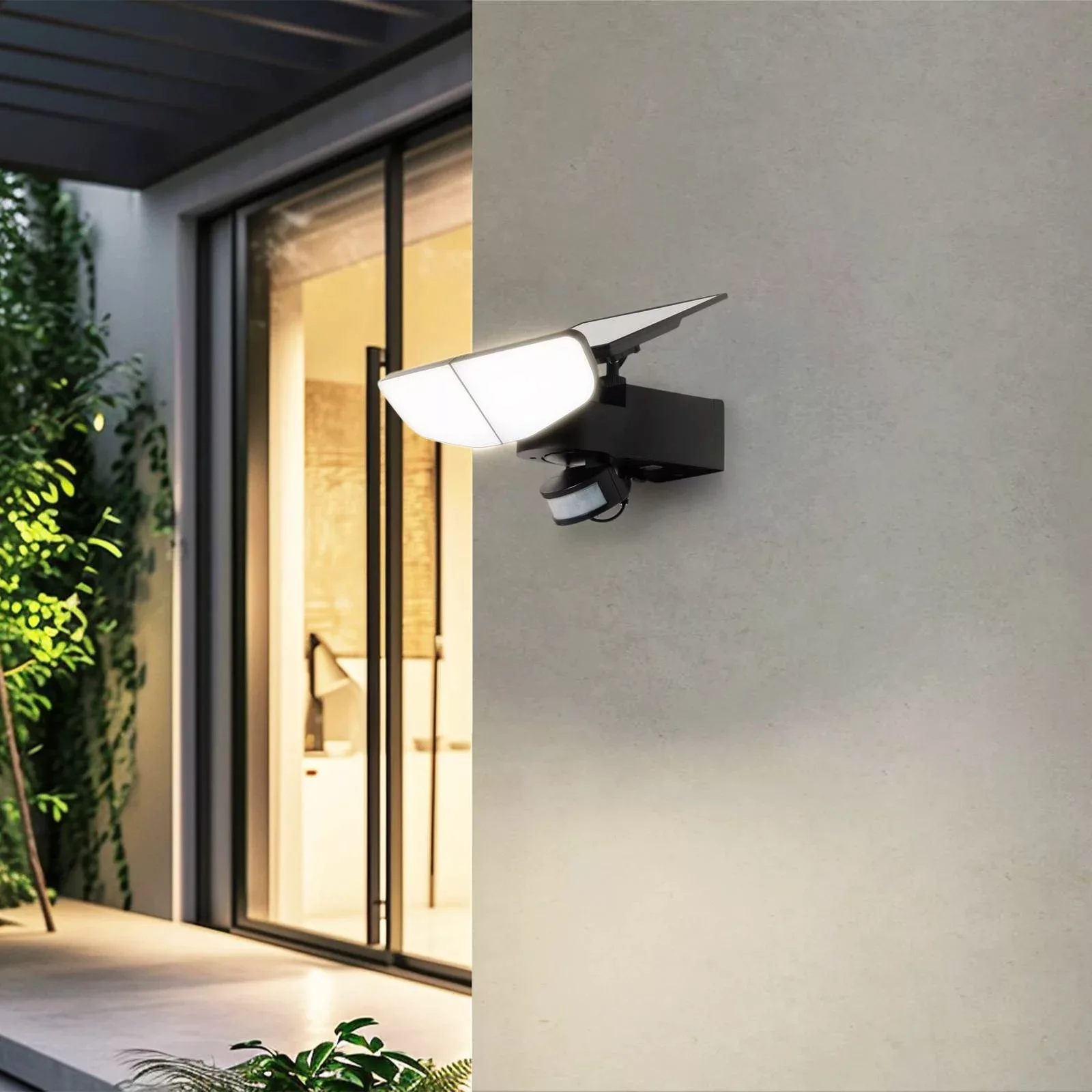 Lindby LED-Solarwandleuchte Naelin, schwarz, Sensor, IP44 günstig online kaufen