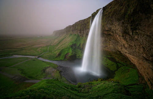 Papermoon Fototapete »Photo-Art WILLY MARTHINUSSEN, WASSERFALL IN DER LANDS günstig online kaufen