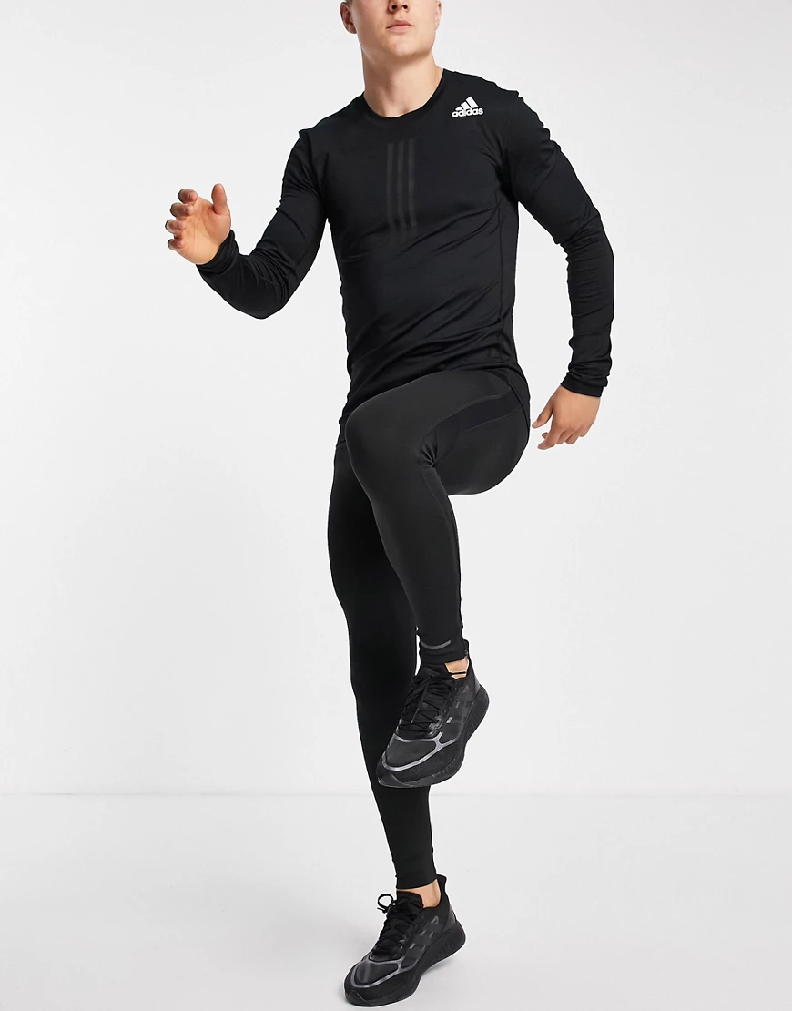 adidas – Running – Strumpfhose in Schwarz mit farblich abgesetztem Logo günstig online kaufen