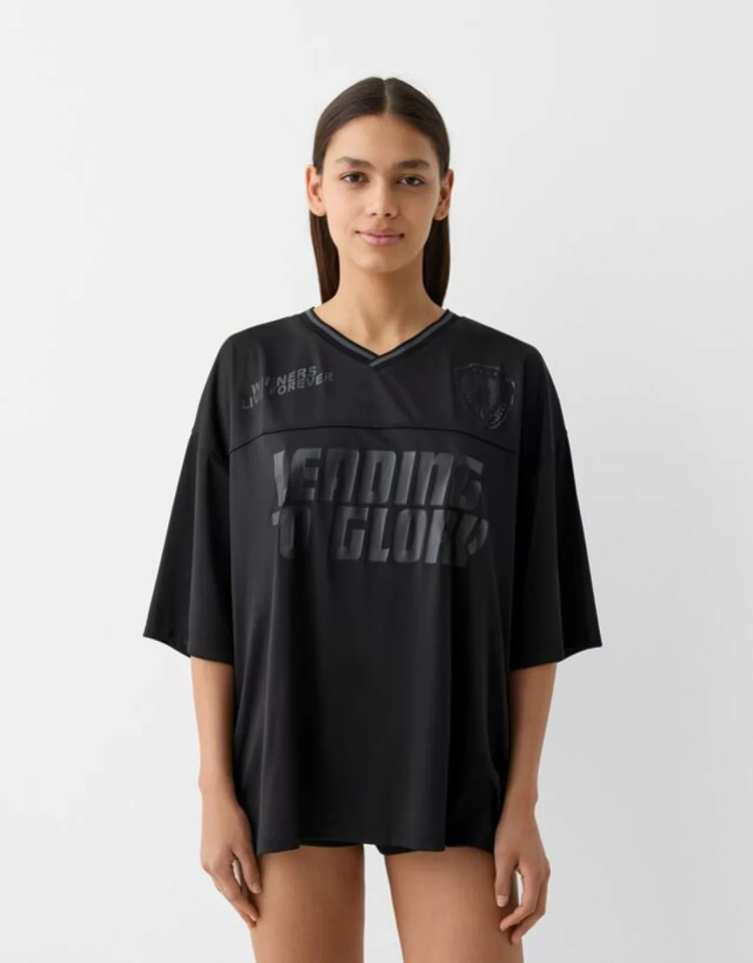 Bershka Sportliches T-Shirt Mit Kurzen Ärmeln Und Print Damen M Schwarz günstig online kaufen