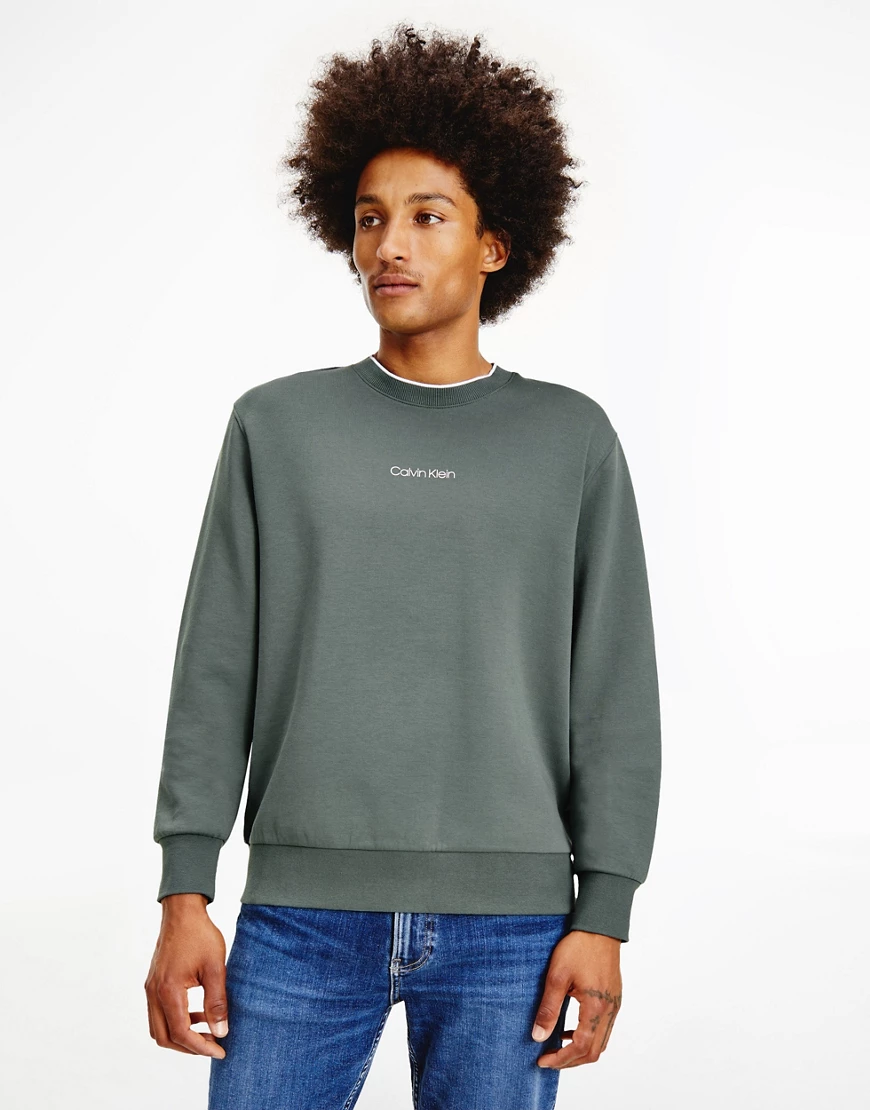Calvin Klein Jeans – Sweatshirt in Grün mit Logo günstig online kaufen