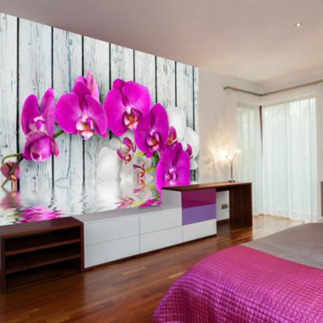 artgeist Fototapete Violet orchids with water reflexion mehrfarbig Gr. 200 günstig online kaufen