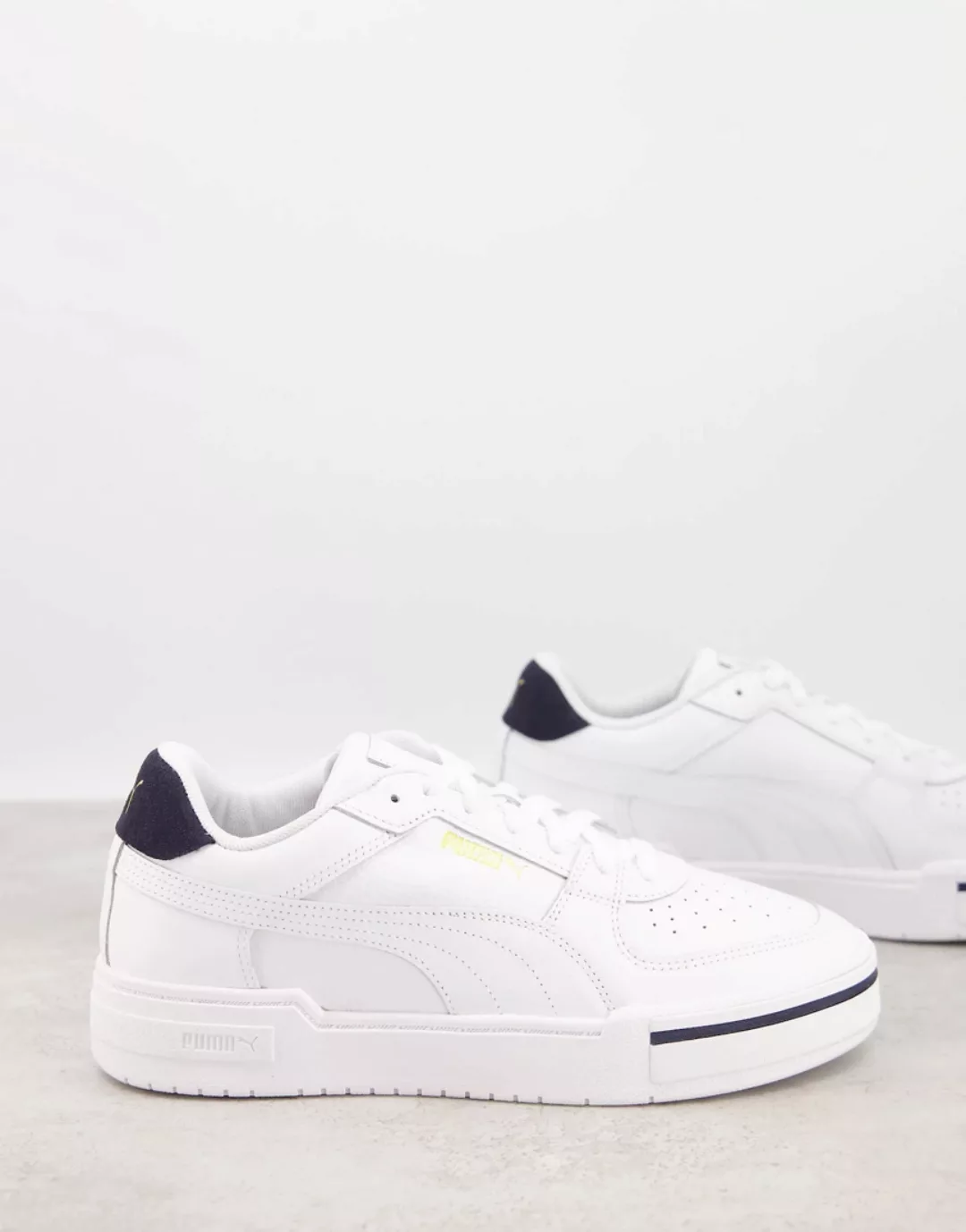 PUMA – CA Pro Heritage – Sneaker in Weiß und Marineblau günstig online kaufen