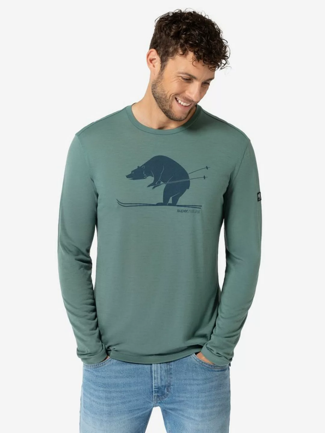 SUPER.NATURAL Langarmshirt für Herren, Merino SKI KARL Ski Motiv, atmungsak günstig online kaufen