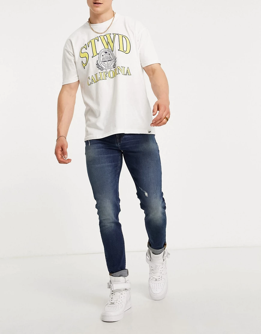 ASOS DESIGN – Eng geschnittene Jeans in dunkler „Less Thirsty“-Waschung mit günstig online kaufen