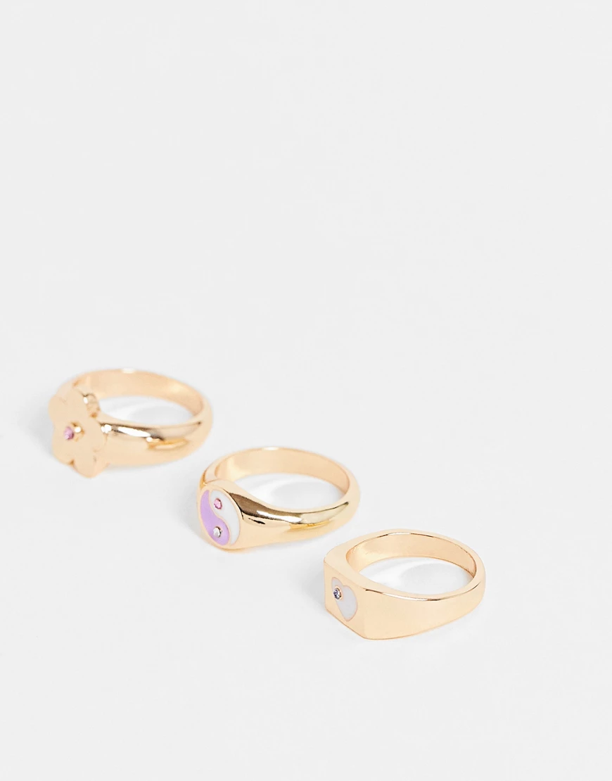 ASOS DESIGN – Goldfarbene Ringe in verschiedenen verspielten Designs im 3er günstig online kaufen