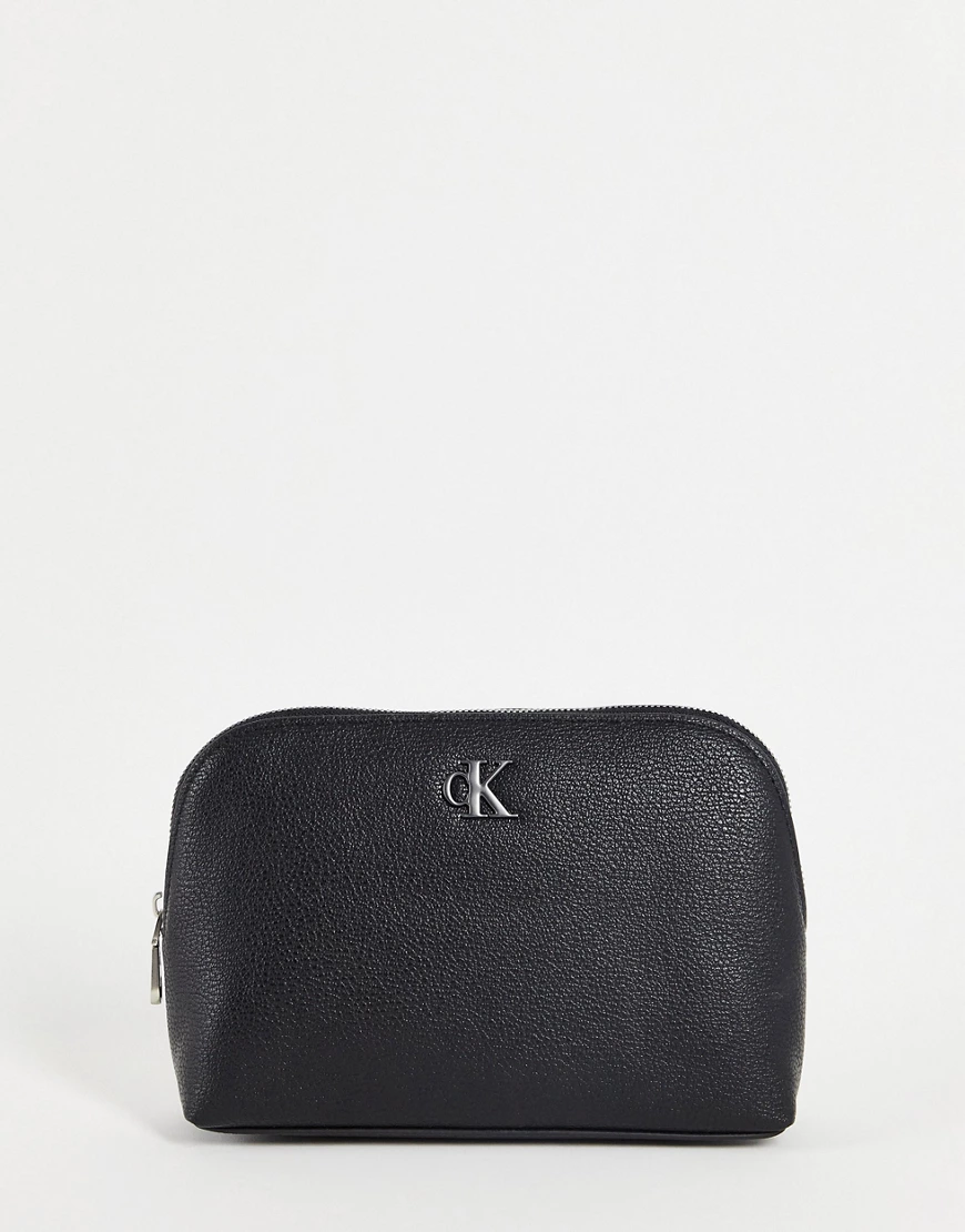 Calvin Klein Jeans – Kosmetiktasche in Schwarz mit Monogramm-Logo günstig online kaufen