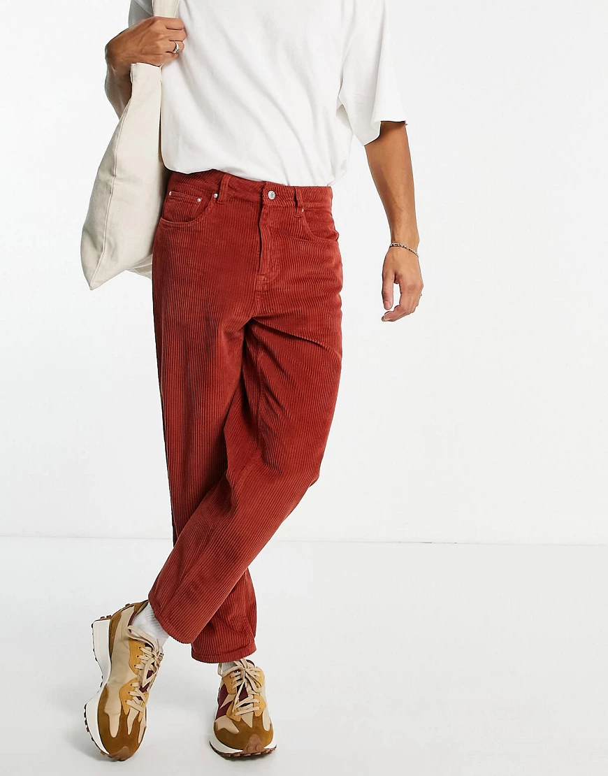 ASOS DESIGN – Legere, schmal zulaufende Cord-Jeans in Rostrot-Orange günstig online kaufen