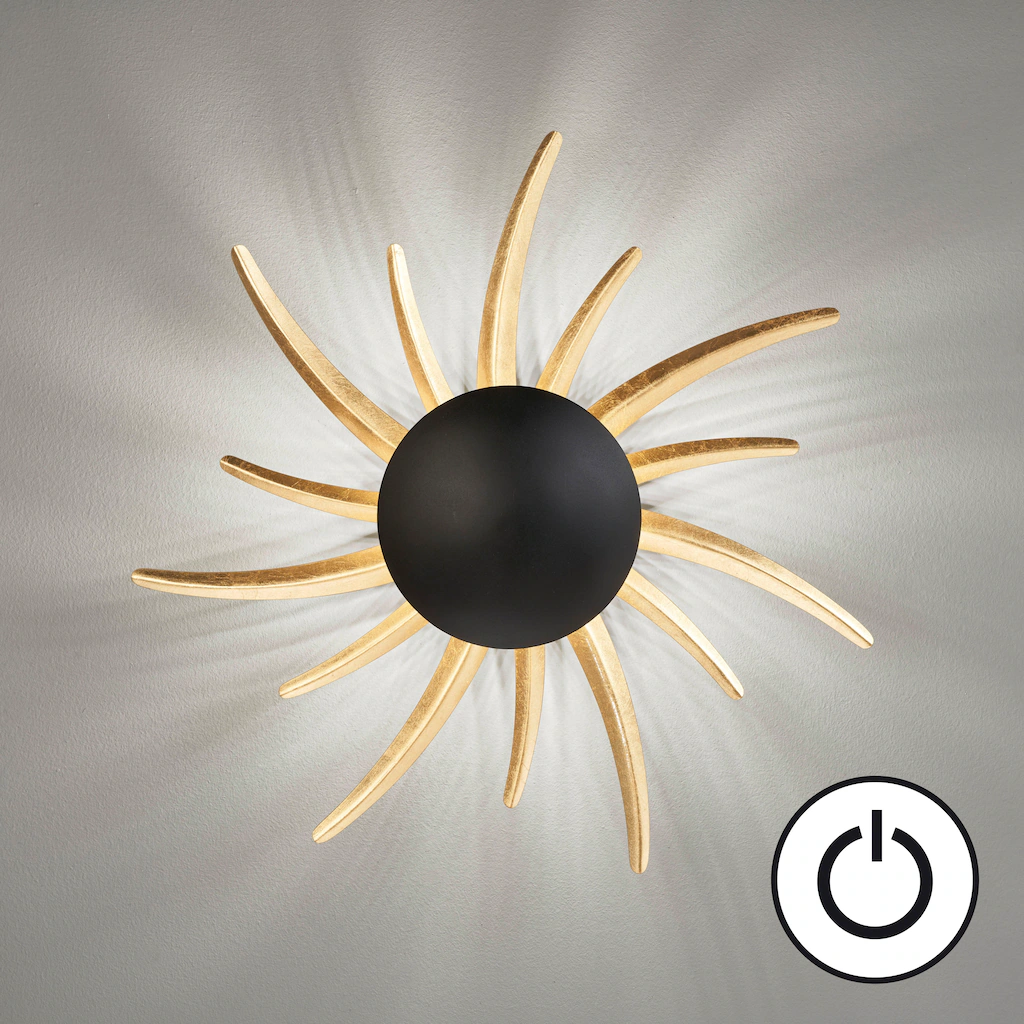 LED-Wandleuchte Sol, schwarz mit goldenen Strahlen günstig online kaufen