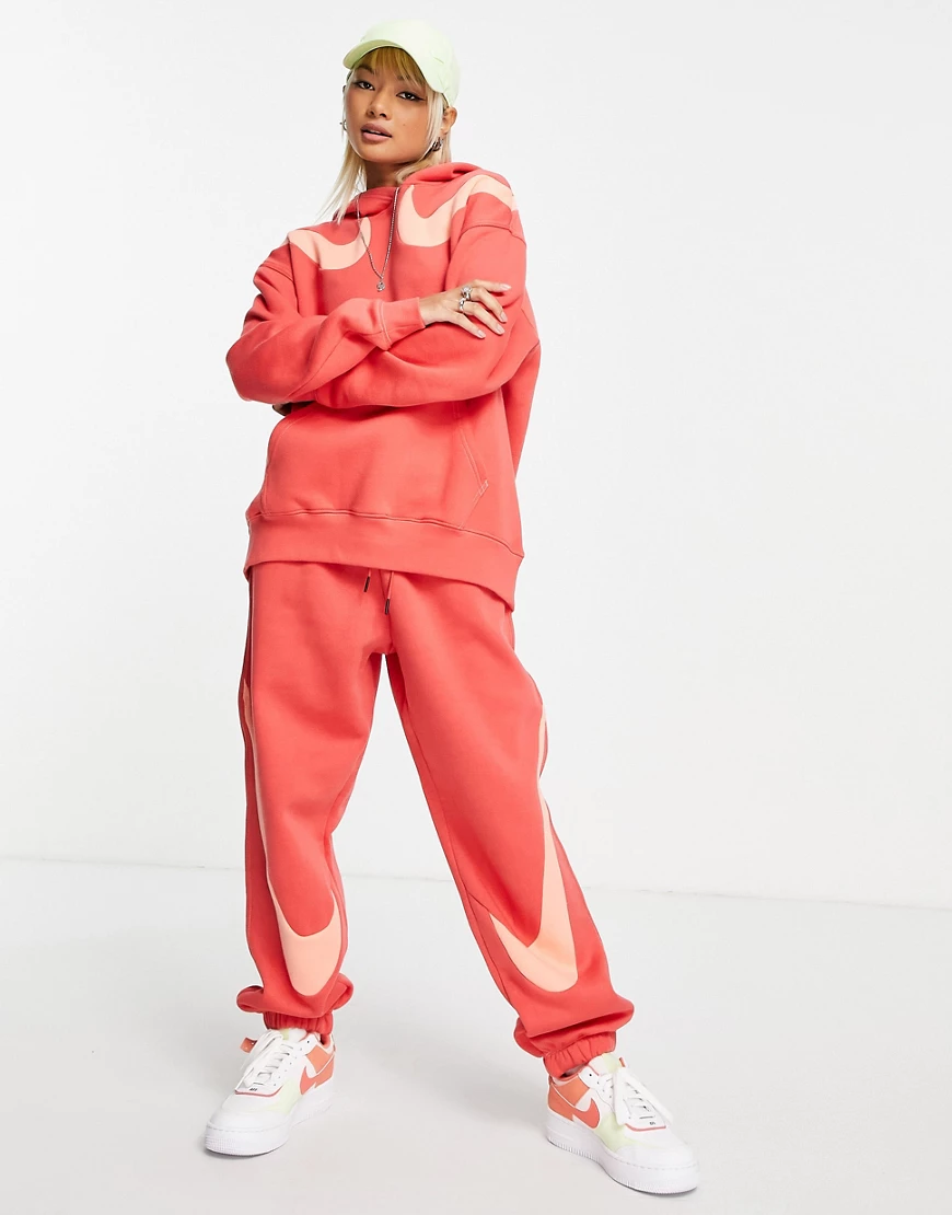 Nike – Fleece-Jogginghose in Hummerrot mit Swoosh-Logo, SUIT 28-Rosa günstig online kaufen