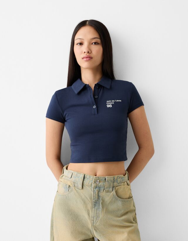 Bershka T-Shirt Mit Kurzen Ärmeln, Polo-Kragen Und Print Damen L Marinenbla günstig online kaufen