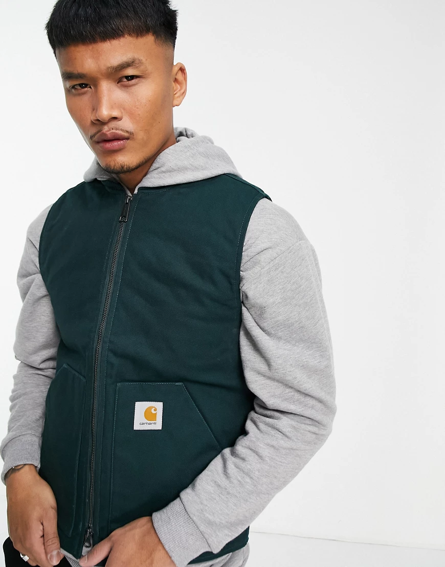 Carhartt WIP – Gefütterte Weste in Tannengrün günstig online kaufen