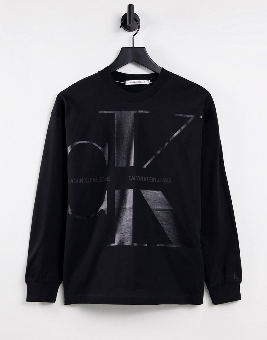 Calvin Klein Jeans – Langärmliges Shirt mit großem Logo in Schwarz günstig online kaufen