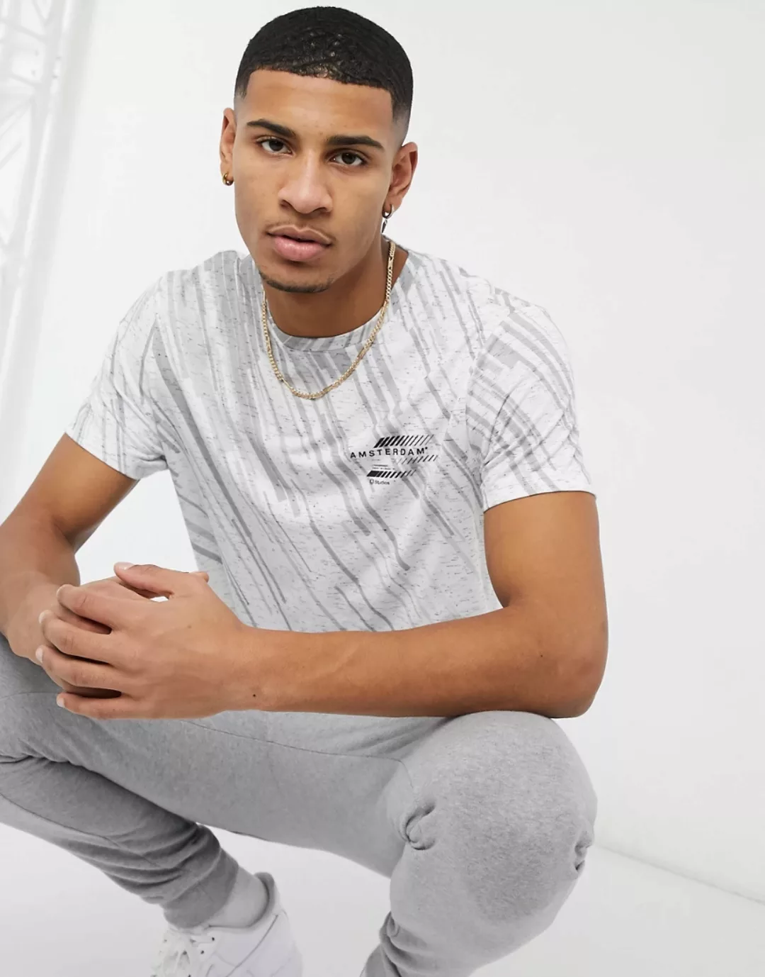 Burton Menswear – T-Shirt mit Melange-Block-Muster in Stone-Neutral günstig online kaufen