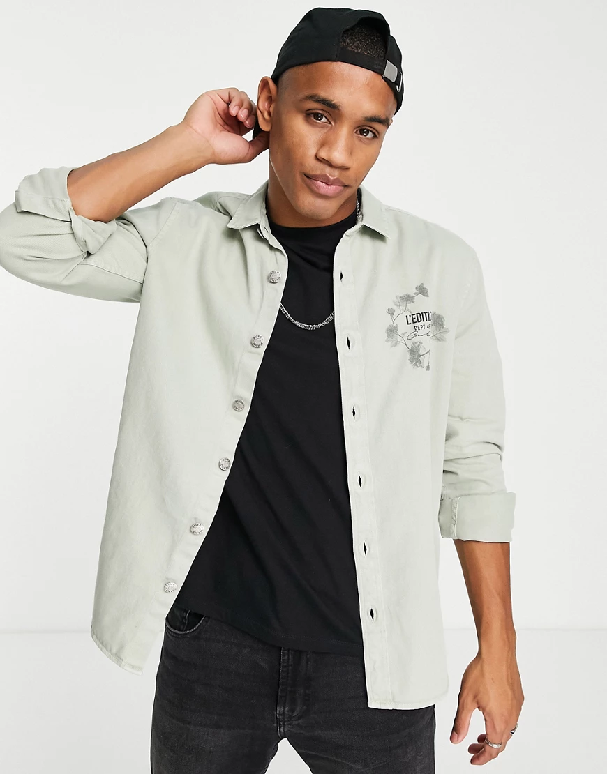 River Island – Hemd in Grün mit Print auf der Brust und Reverskragen günstig online kaufen