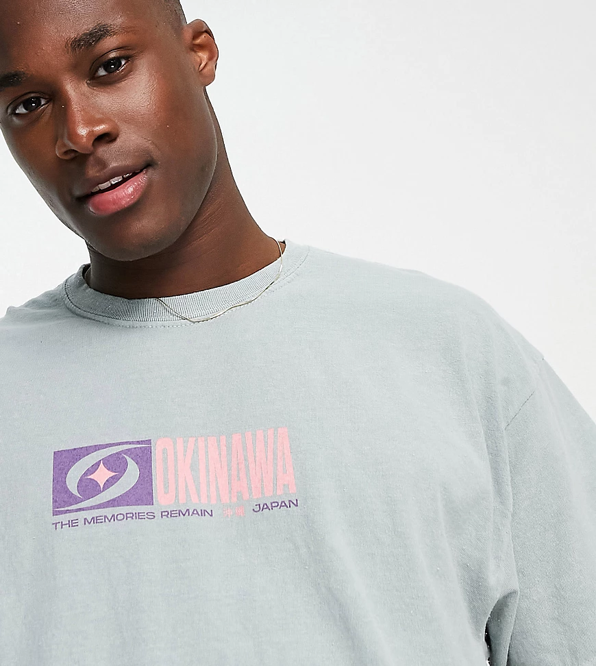 New Look – Okinawa – Grünes Oversize-T-Shirt mit Print in Overdyed-Optik günstig online kaufen