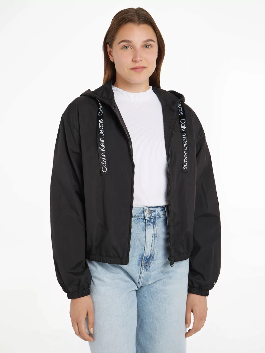 Calvin Klein Jeans Outdoorjacke "LOGO DRAWSTRING WINDBREAKER", mit Kapuze, günstig online kaufen