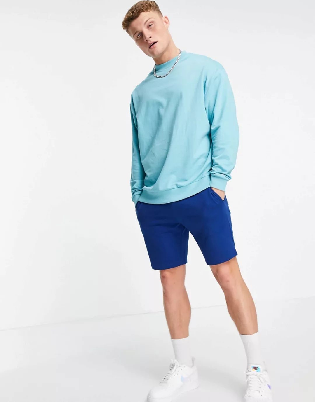 ASOS DESIGN – Leichtes Oversize-Sweatshirt aus Biomaterial in Blau-Grün günstig online kaufen