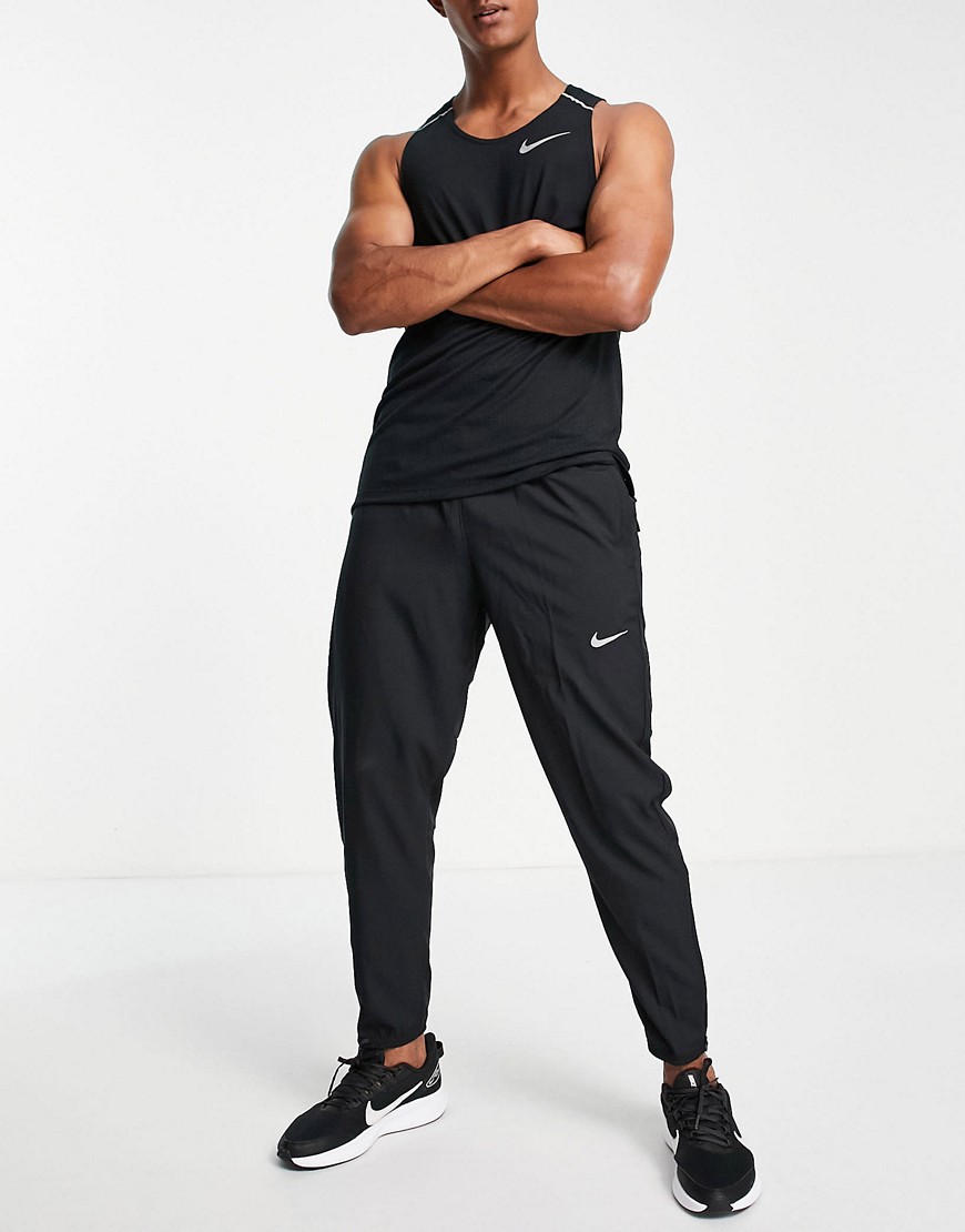 Nike Running – Challenger Dri-FIT – Gewebte Jogginghose in Schwarz günstig online kaufen