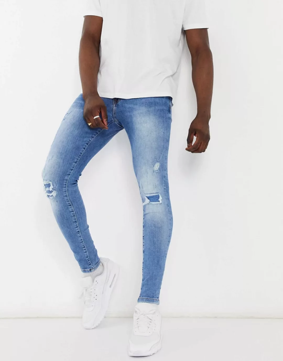 River Island – Hautenge Jeans mit Zierrissen in Hellblau günstig online kaufen