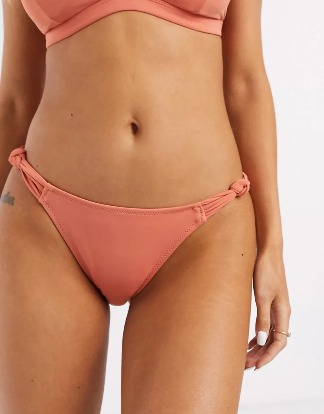 New Look – Bikiniunterteil mit Knotendetail seitlich in Koralle-Orange günstig online kaufen