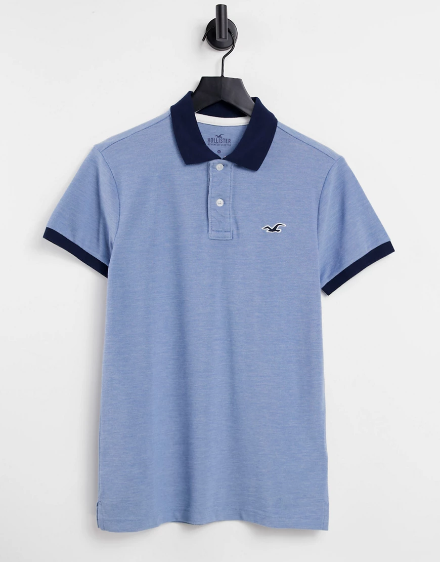 Hollister – Poloshirt mit Aufdruck in Marine-Marineblau günstig online kaufen