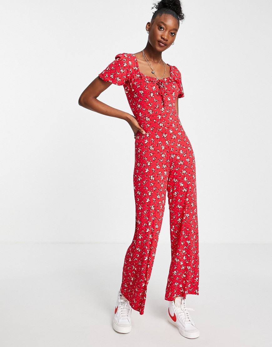 ASOS DESIGN – Jumpsuit mit Schnürung und Blümchenmuster in Rot-Mehrfarbig günstig online kaufen