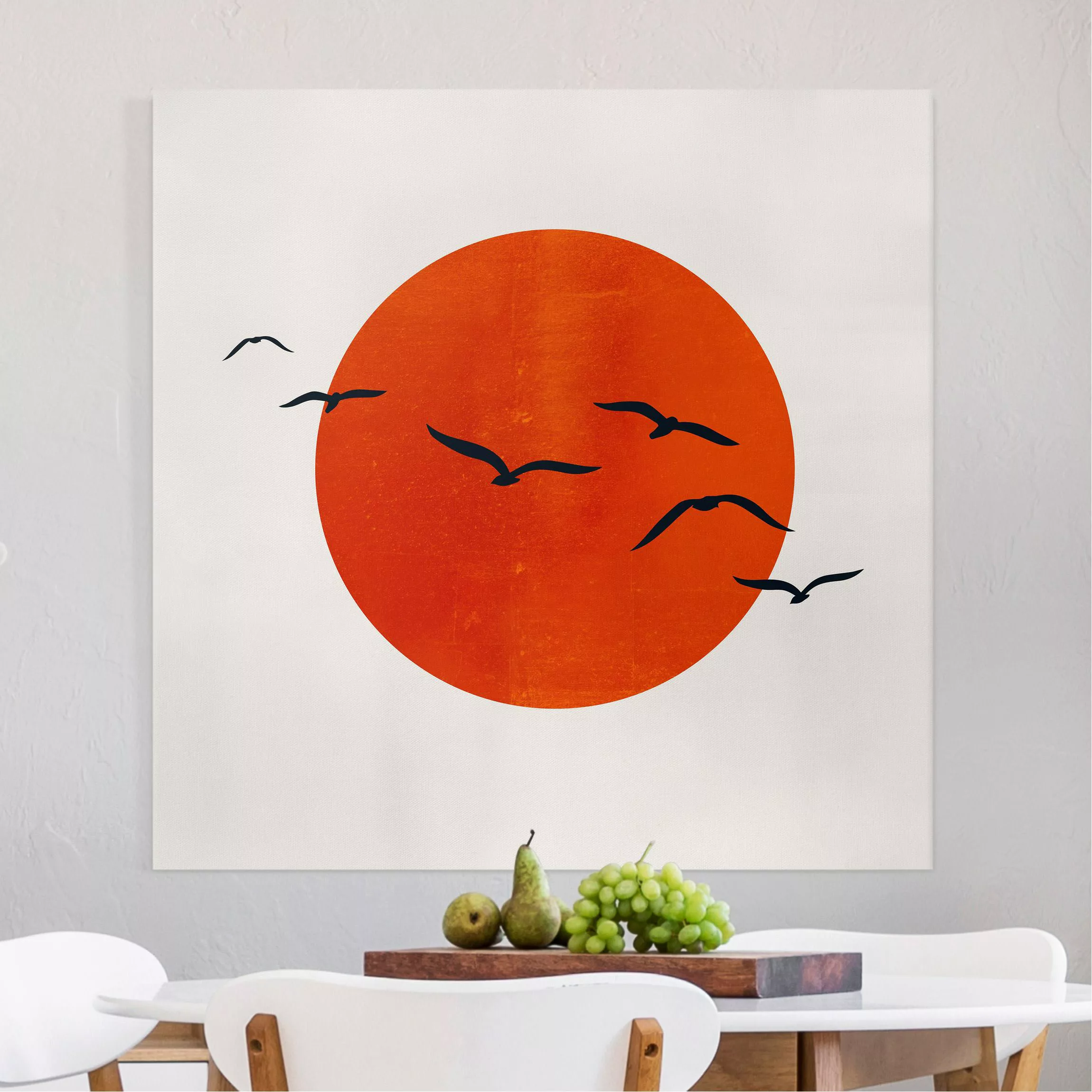 Leinwandbild Vogelschwarm vor roter Sonne I günstig online kaufen