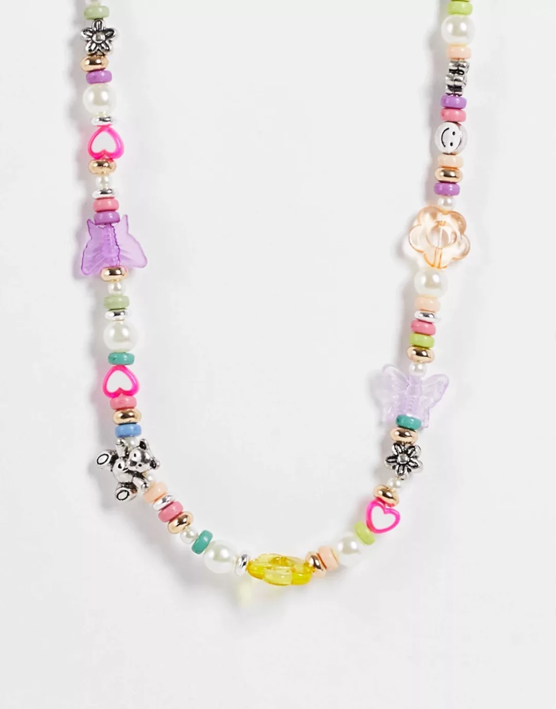 ASOS DESIGN – Perlenhalskette mit verschiedenen witzigen Perlen-Mehrfarbig günstig online kaufen