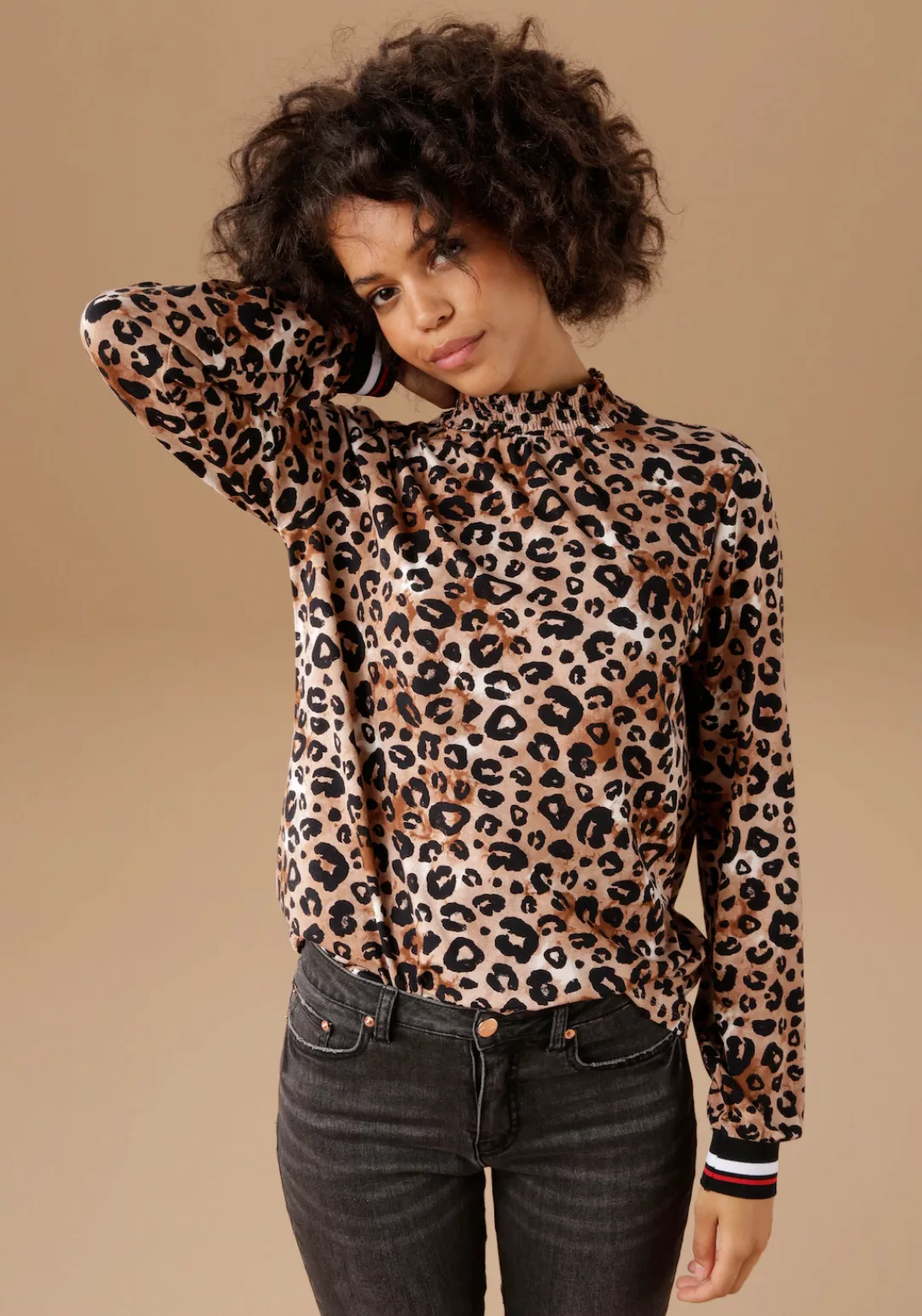 Aniston CASUAL Langarmshirt, mit trendigem Animal-Print und gestreiften Bün günstig online kaufen