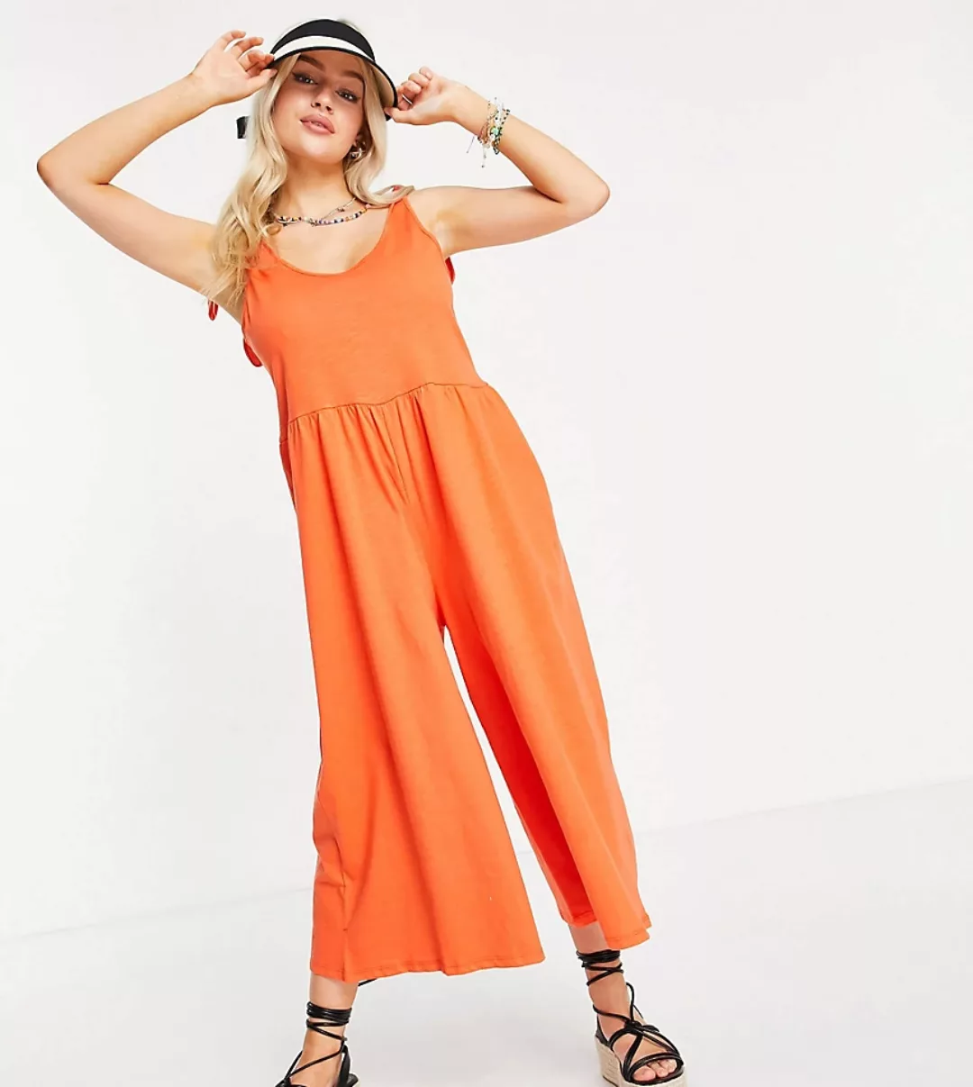 ASOS DESIGN Petite – Hänger-Jumpsuit in kräftigem Orange mit Bindedetail an günstig online kaufen