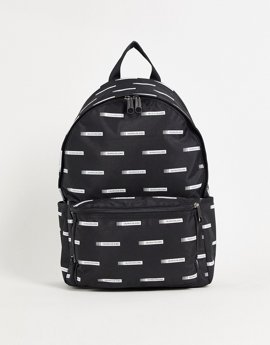 Calvin Klein Jeans – Durchgehend bedruckter Rucksack in Schwarz günstig online kaufen