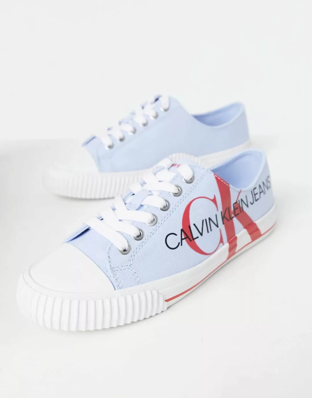 Calvin Klein Jeans – Demianne – Sneaker in Blau/Rot günstig online kaufen