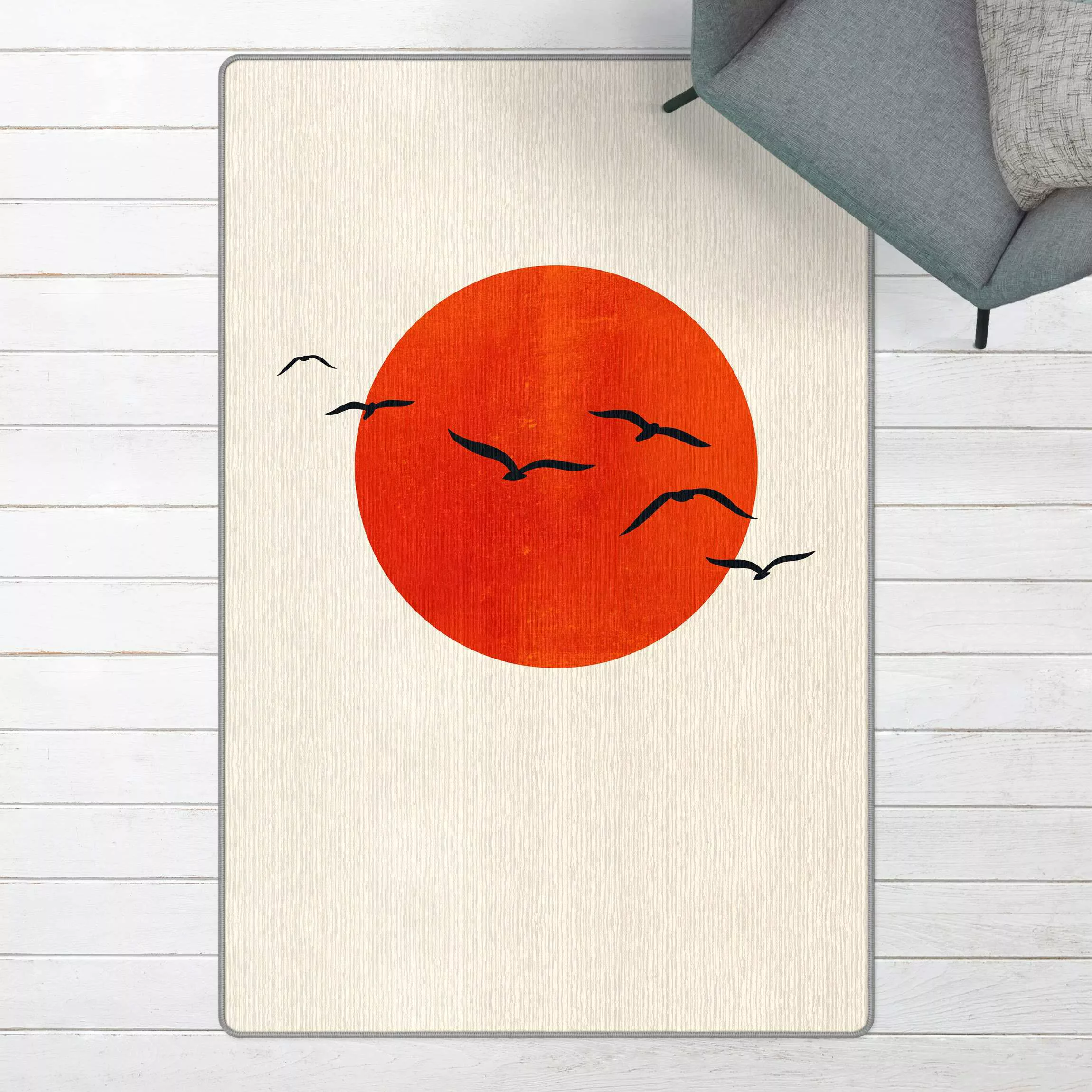Teppich Vogelschwarm vor roter Sonne I günstig online kaufen