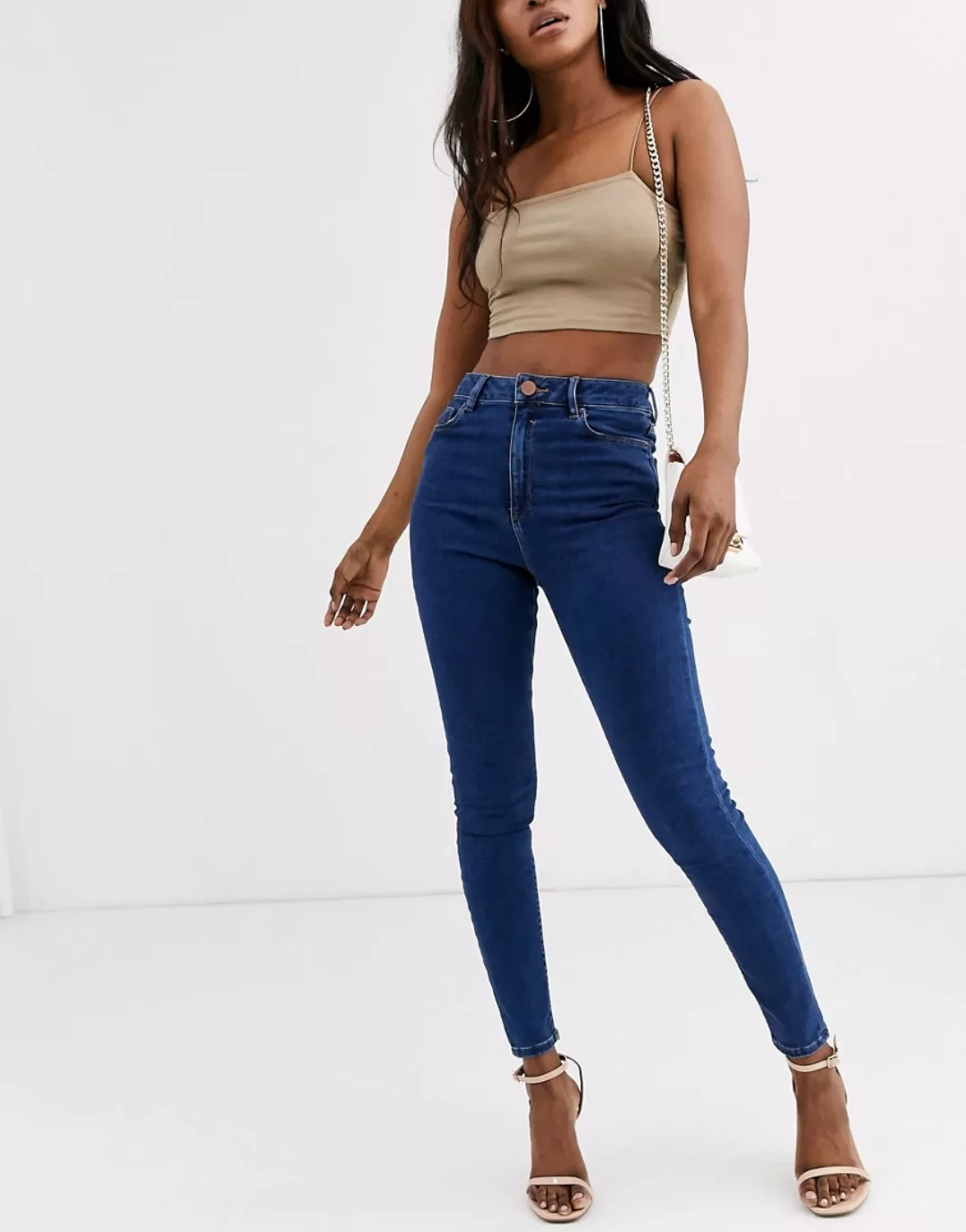 ASOS DESIGN – Ridley – Enge Jeans mit hohem Bund in verwaschenem Mittelsatt günstig online kaufen