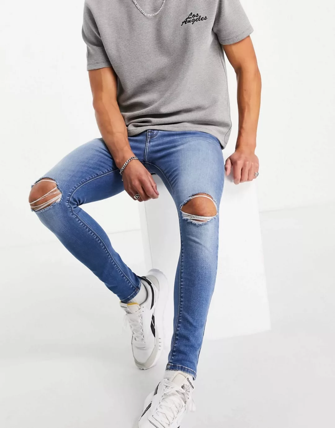 ASOS DESIGN – Hautenge Jeans in mittlerer Waschung mit Power-Stretch und ze günstig online kaufen