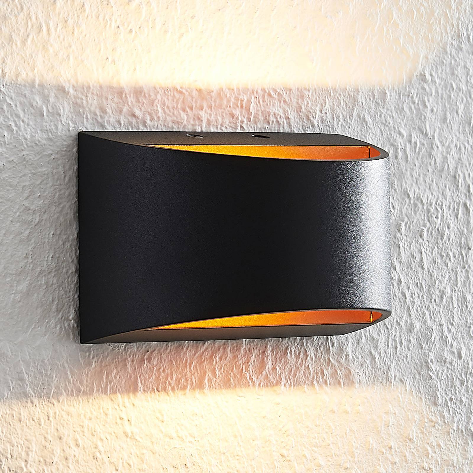 Arcchio Jasina LED-Wandlampe, halbrund, schwarz günstig online kaufen