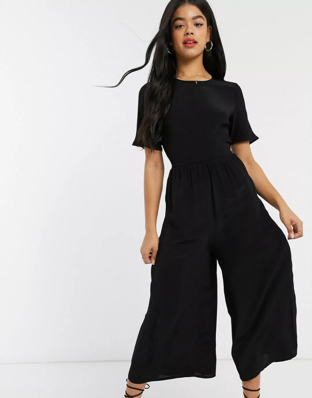 ASOS DESIGN – Schwarzer Jumpsuit mit Knöpfen hinten günstig online kaufen