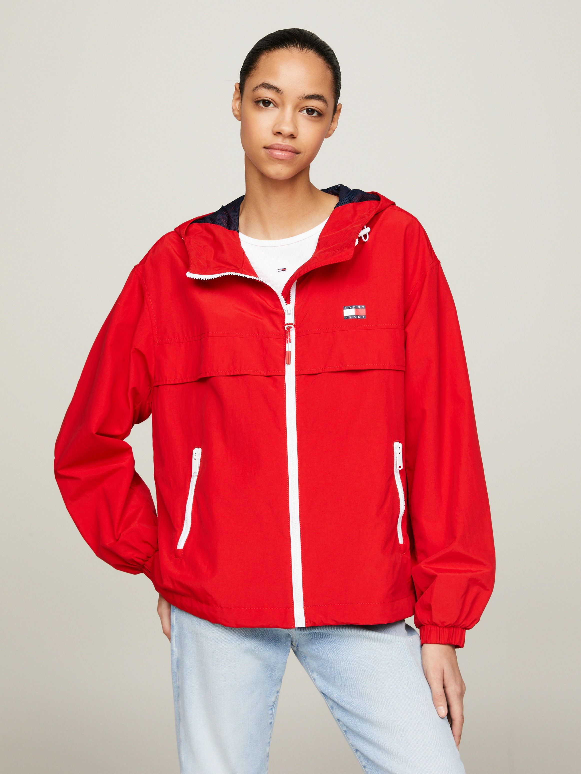 Tommy Jeans Windbreaker "TJW CHICAGO WINDBREAKER EXT", mit Kapuze, mit kont günstig online kaufen