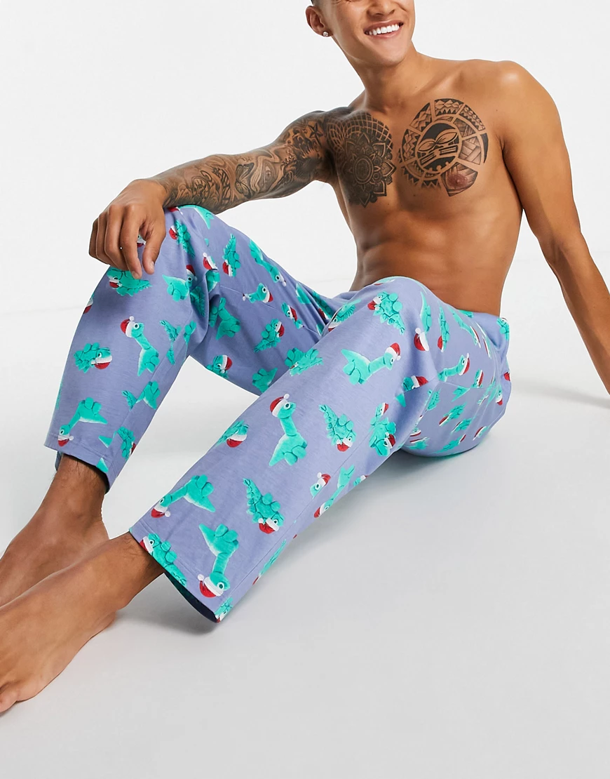 ASOS DESIGN – Weihnachtliche Lounge-Hose mit Dinosaurier-Print-Mehrfarbig günstig online kaufen