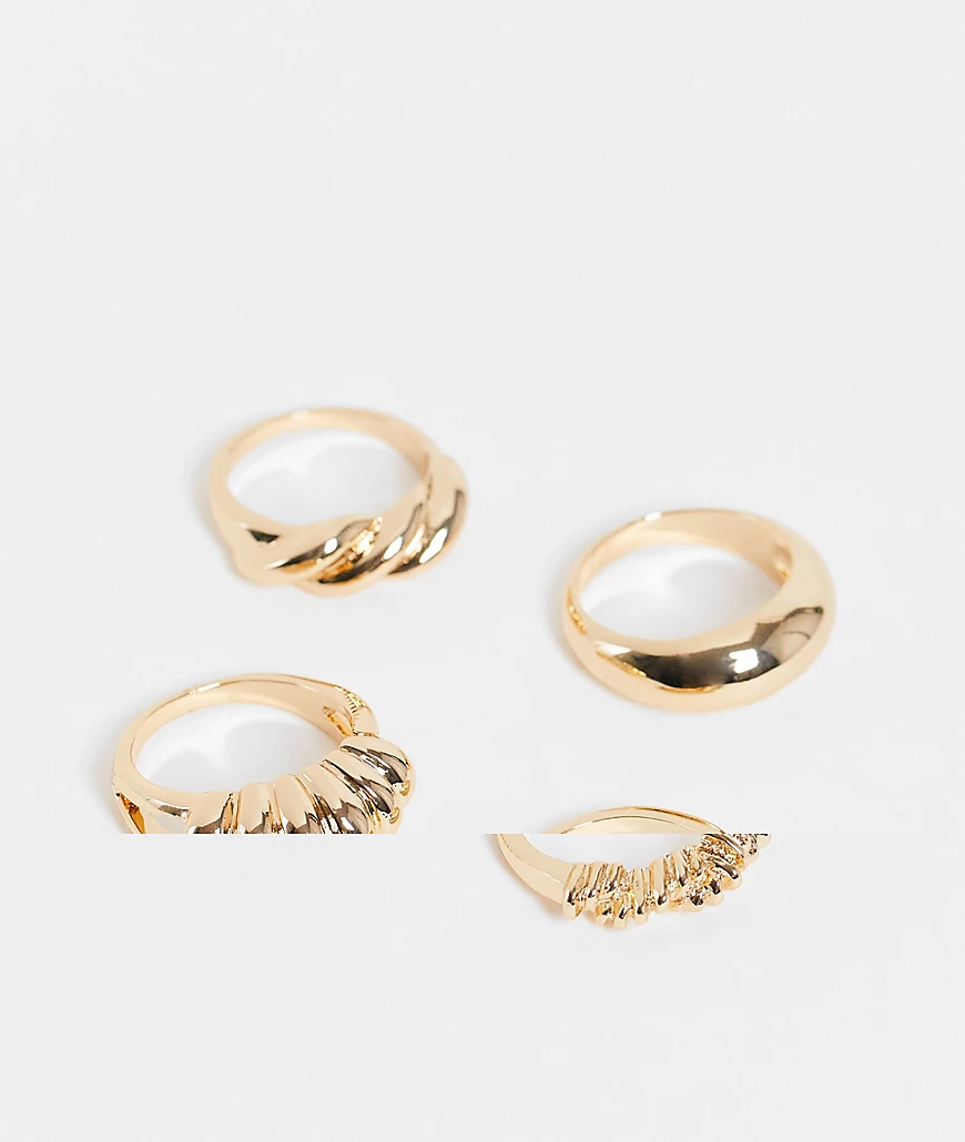 ASOS DESIGN Curve – 4er-Set Ringe in Goldfarbton mit Flechtdesign-Goldfarbe günstig online kaufen