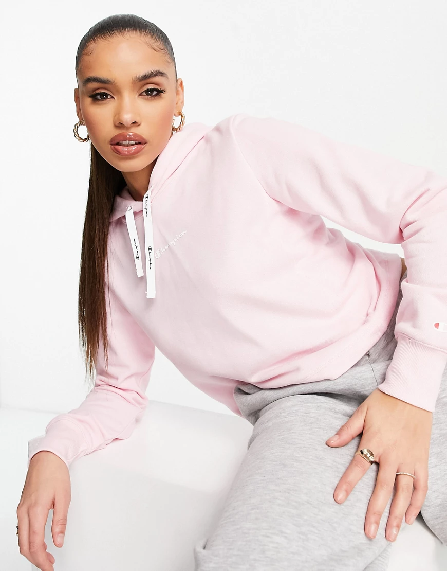 Champion – Kapuzenpullover in Rosa mit Logo günstig online kaufen