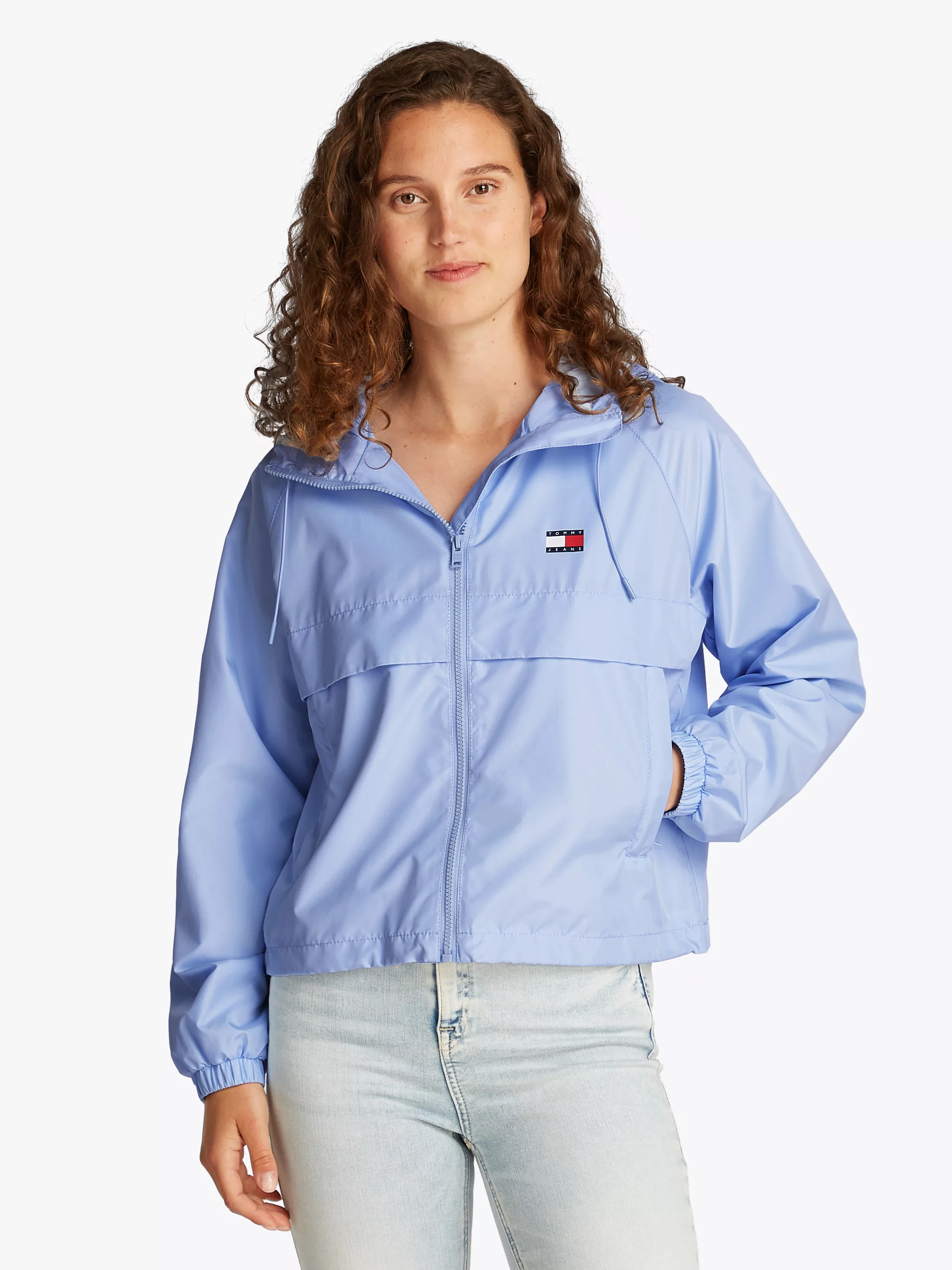 Tommy Jeans Windbreaker "TJW ESSENTIAL WINDBREAKER EXT", mit Kapuze, mit Lo günstig online kaufen