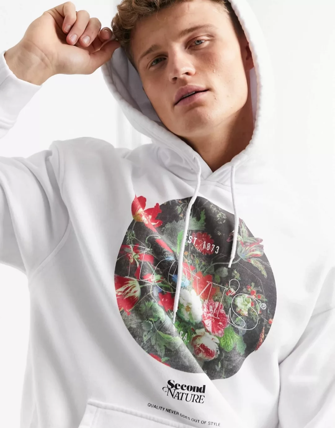 Levi's – Weiter Kapuzenpullover mit floralem, rundem Logo in Weiß günstig online kaufen
