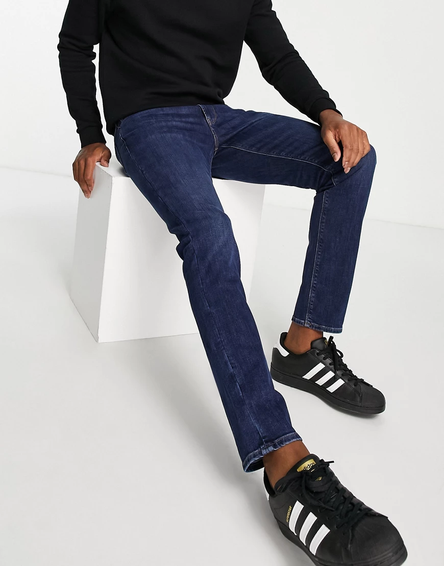 Emporio Armani – J06 – Schmale Jeans in mittlerer Waschung-Blau günstig online kaufen